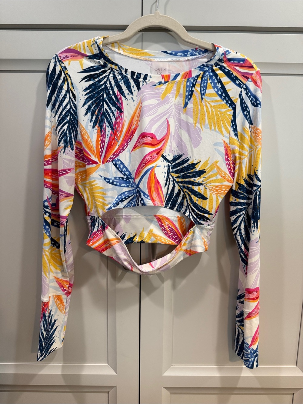 CALIA by Carrie Underwood women's long-sleeve crop rash guard Size M